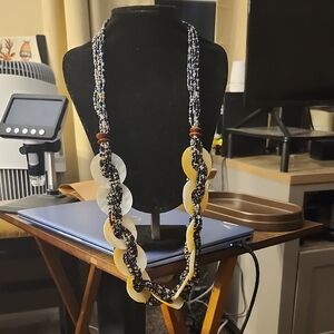 Elegant Beaded Necklace with Gold and Black Accents